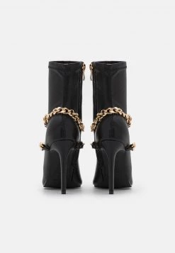 RAID BENNETT Bottines à Talons Hauts Black Femme -Pas Cher RAID Boutique 54eb12f26c21494680a98c408325ae95