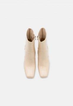 RAID SILONNA Bottines à Talons Hauts Off White Femme -Pas Cher RAID Boutique b2262d332604492faec769744fb5db24