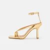 RAID MEEKA Tongs Gold Femme